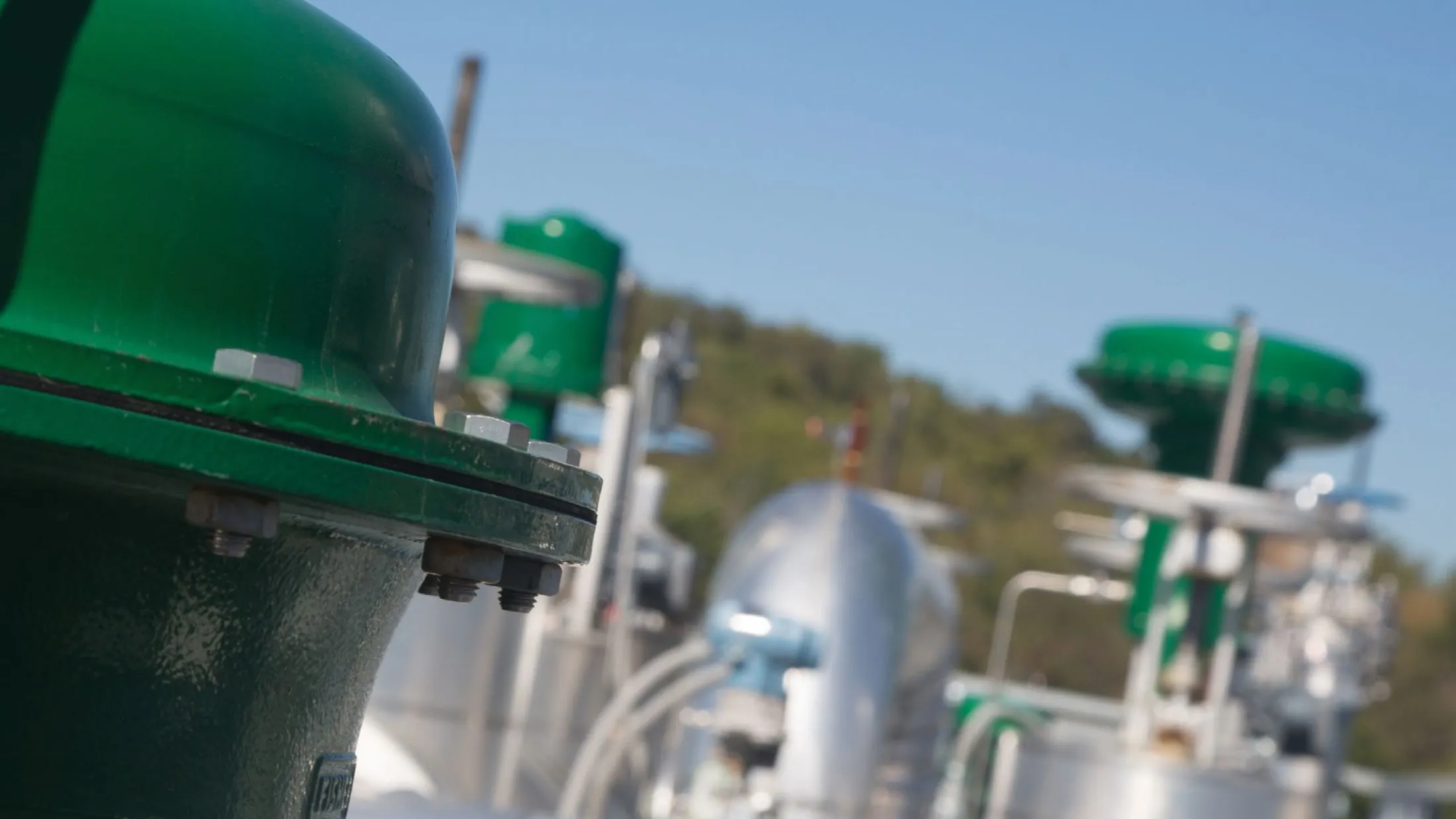 Fisher™ spring-and-diaphragm pneumatic actuators installed on control valves at a process plant